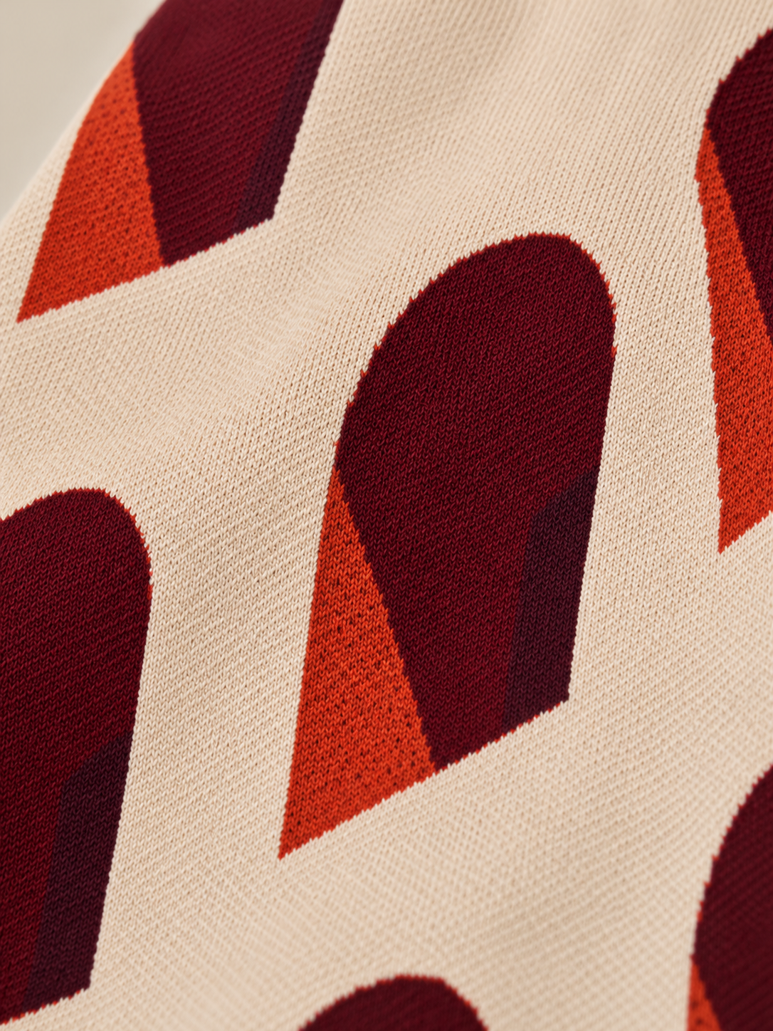 AFORMA Façade oversized unisex knit vest in blush and burgundy arch jacquard, view 8